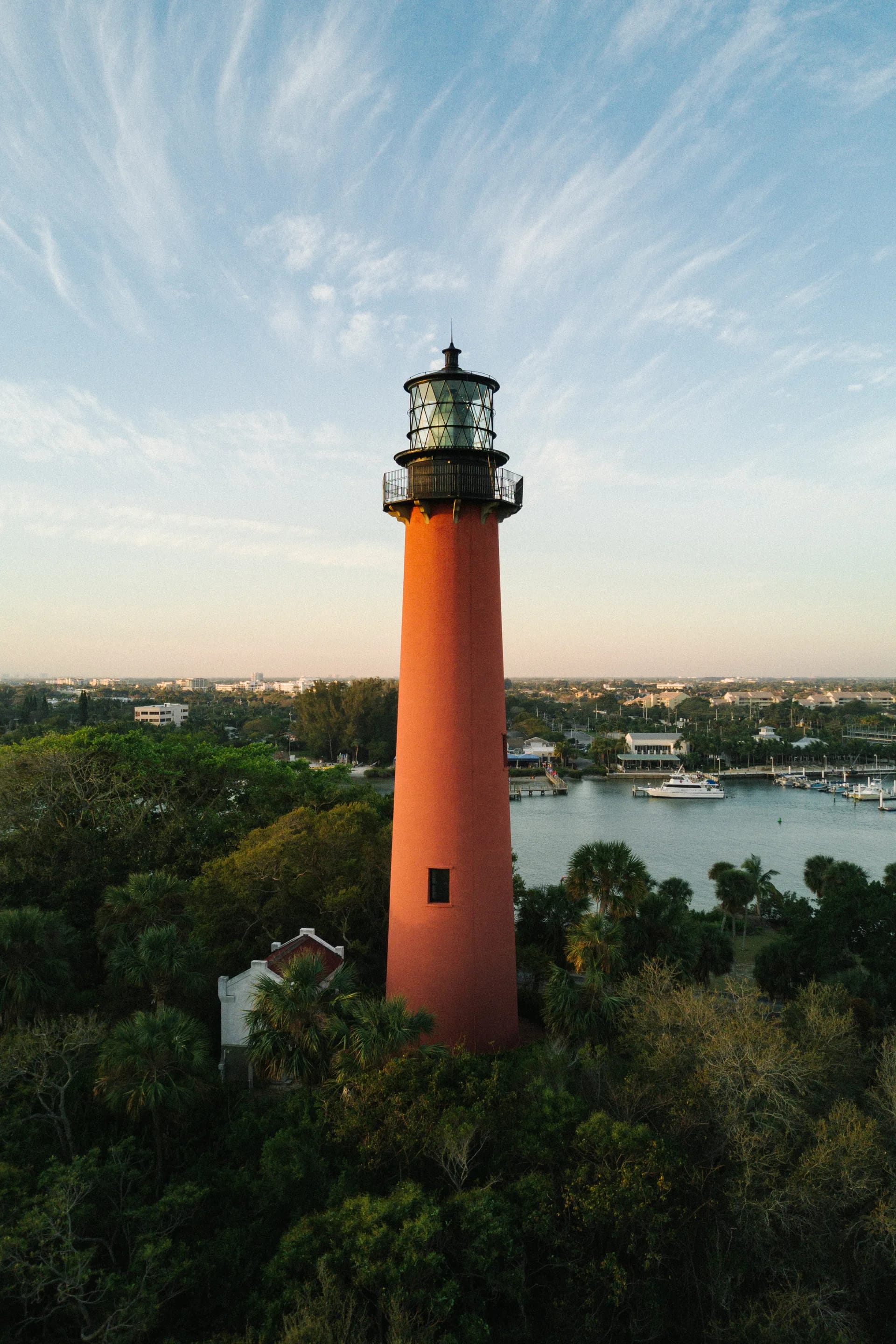 The Jupiter Inlet Lighthouse overlooking boats on the Intracoastal Waterway in Jupiter, Florida